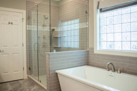 Franklin Tennessee bathroom Remodel walkin shower, grey subway tile, glass door, white tub