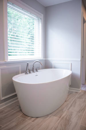 Franklin Tennessee bathroom Remodel white soaking tub, grey tile